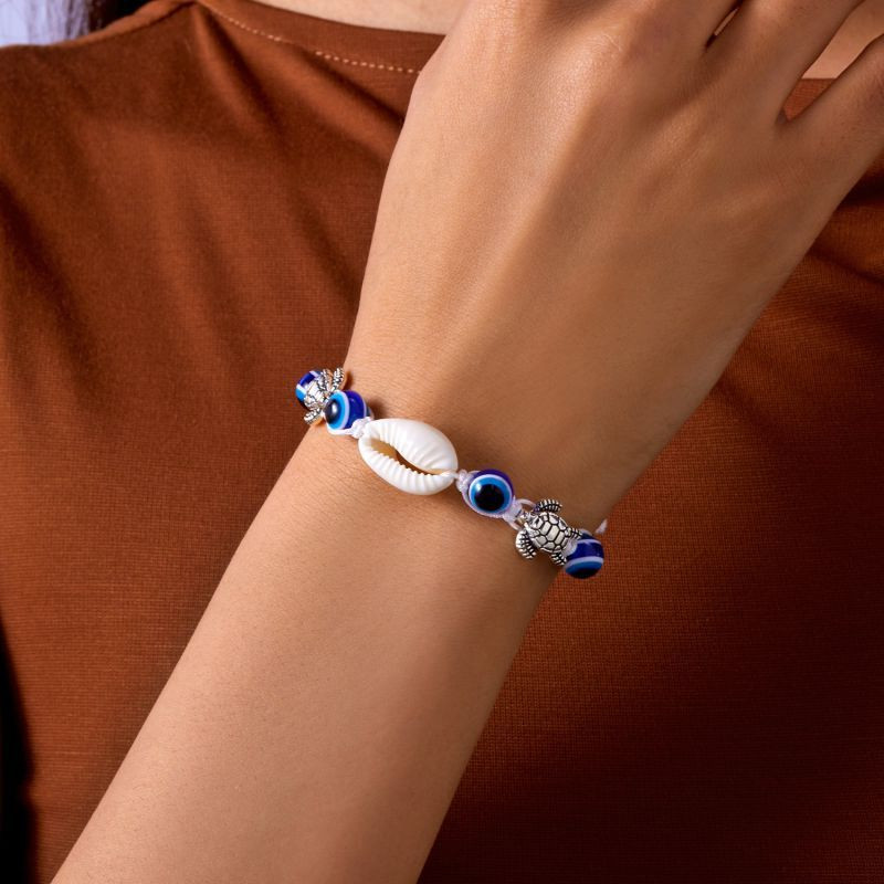 Браслет из синих бусин с ракушкой CJT11315