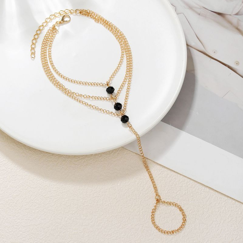 Браслет на палец с темными камнями CJN79202