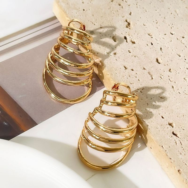 Дизайнерские серьги-пусеты многослойные кольца CJM26888