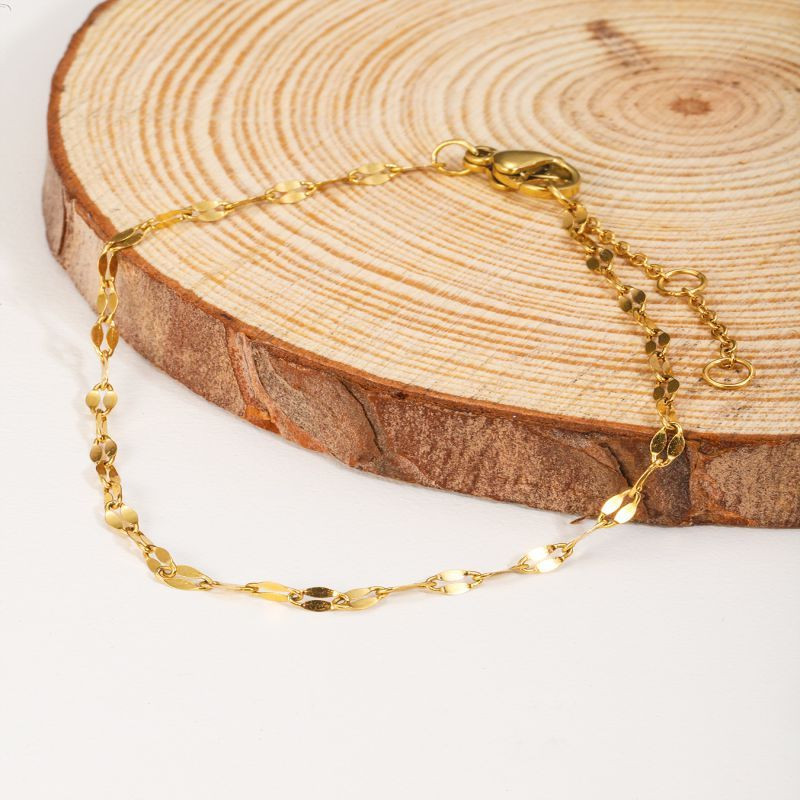 Браслет многослойный с золотистыми фигурными вставками CJL32446