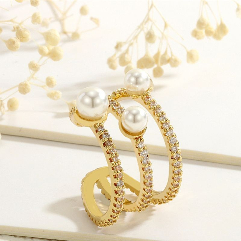 Трехрядное разомкнутое кольцо с фианитами и жемчугом CJG67962