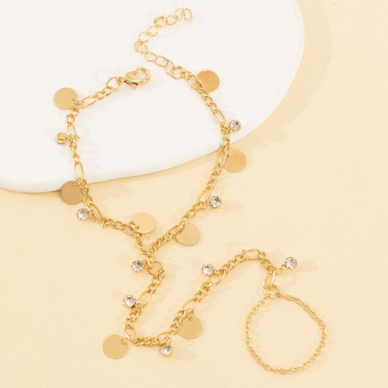 Браслет слейв каскад золотистых монет CJL50196 Браслет слейв каскад золотистых монет CJL50196