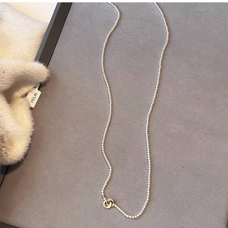 Двойное колье-чокер из мелкого жемчуга с золотистым кольцом CJG36921