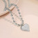 Серебряное колье из стали со снежинкой и сердцем CJZ56409
