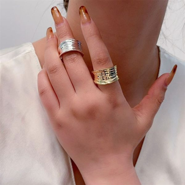 Двойное серебристое кольцо с параллельными шинками CJL47464