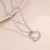 Серебряное колье из стали со снежинкой и сердцем CJZ56410