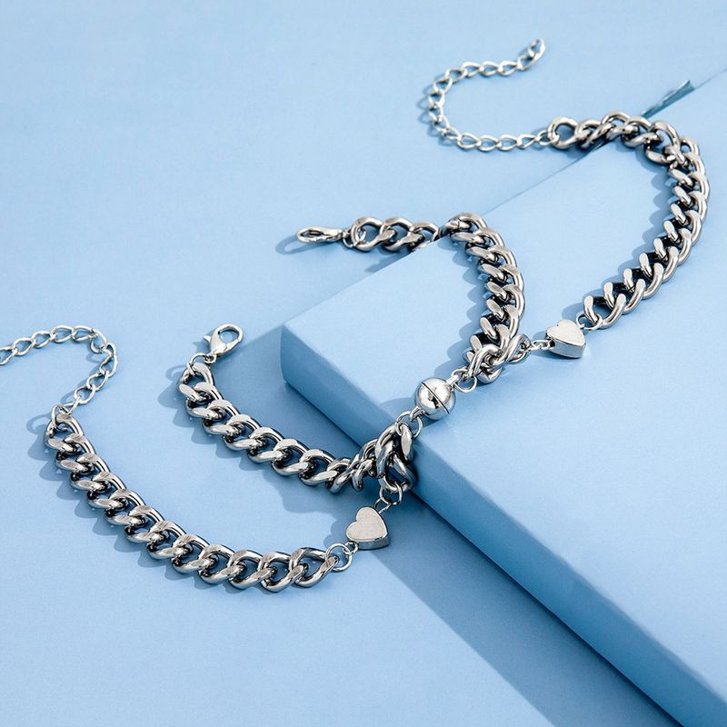 Парные браслеты стальная нежность с магнитным сердцем