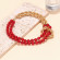 Дерзкое комбинированное колье из красных бус и золотых цепей CJR90180 Дерзкое комбинированное колье из красных бус и золотых цепей CJR90180
