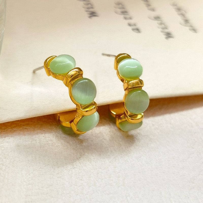 Золотистые серьги-кольца с крупными бусинами кошачий глаз CJN30806 Золотистые серьги-кольца с крупными бусинами кошачий глаз CJN30806