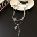 Двойное колье с подвеской-звездой и длинным элементом CJG57231