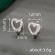 Серебристые серьги с ажурным сердцем из циркона CJX77280