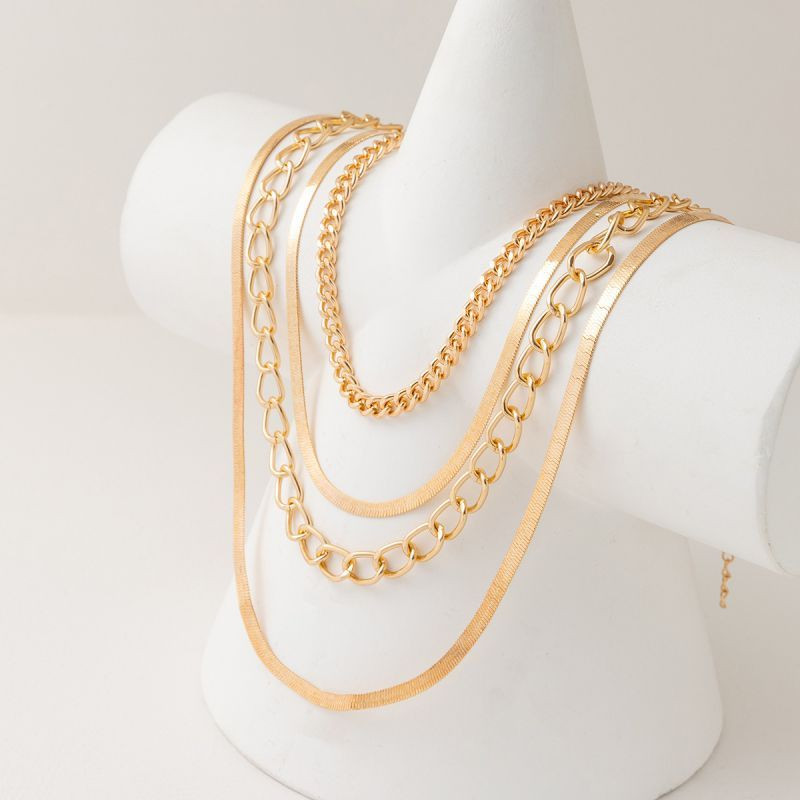 Многослойное золотистое колье из плоских цепей CJH77185