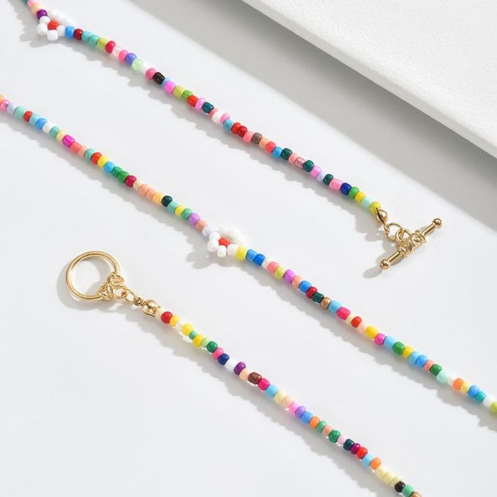 Двойные бусы из разноцветного бисера с цветочными вставками CJM69625