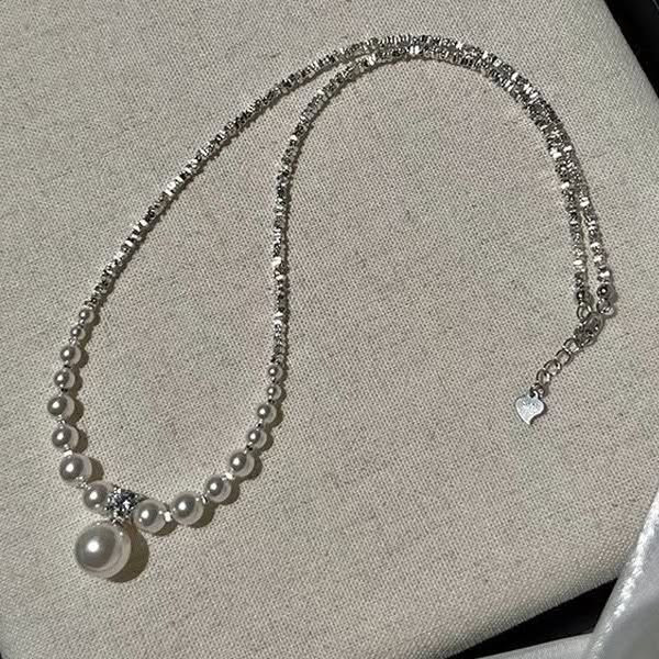 Элегантные жемчужные бусы с нарастающим диаметром 1J11646CJJ