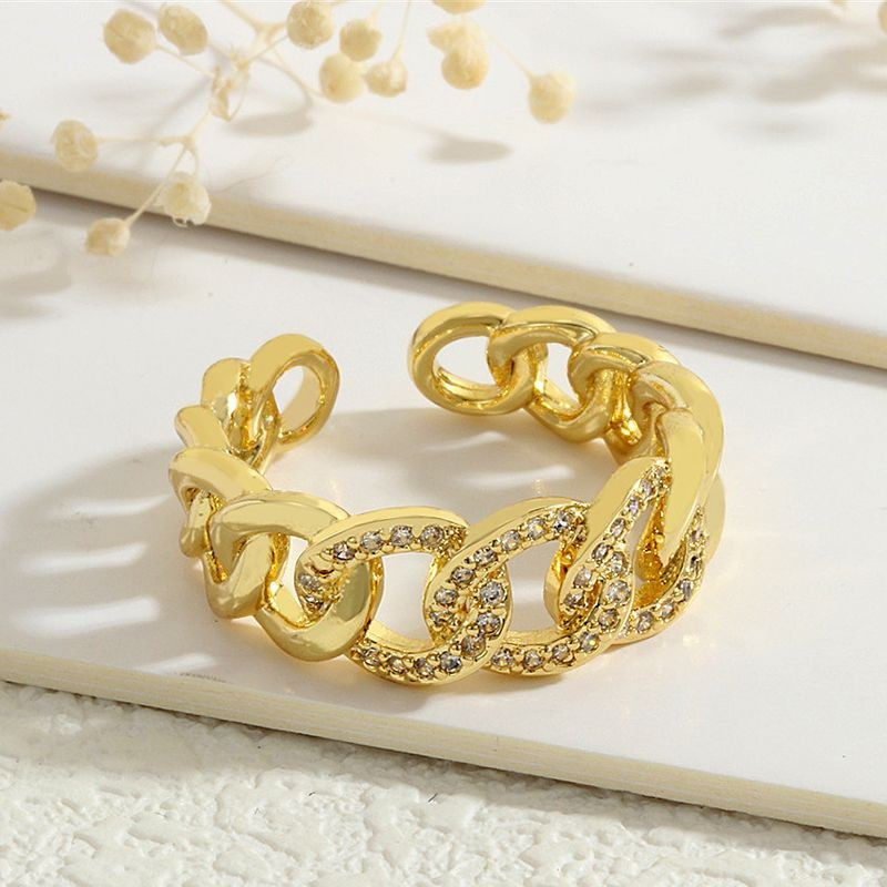 Широкое кольцо-цепь с инкрустацией мелкими кристаллами CJG67714