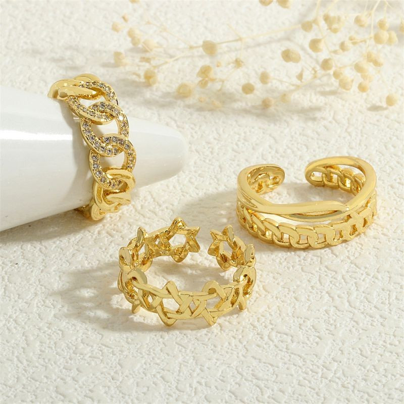 Широкое кольцо-цепь с инкрустацией мелкими кристаллами CJG67714