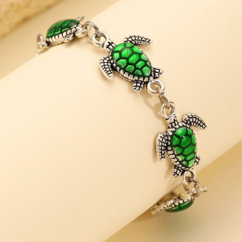 Браслет с зелеными черепахами и кристаллами CJL92319