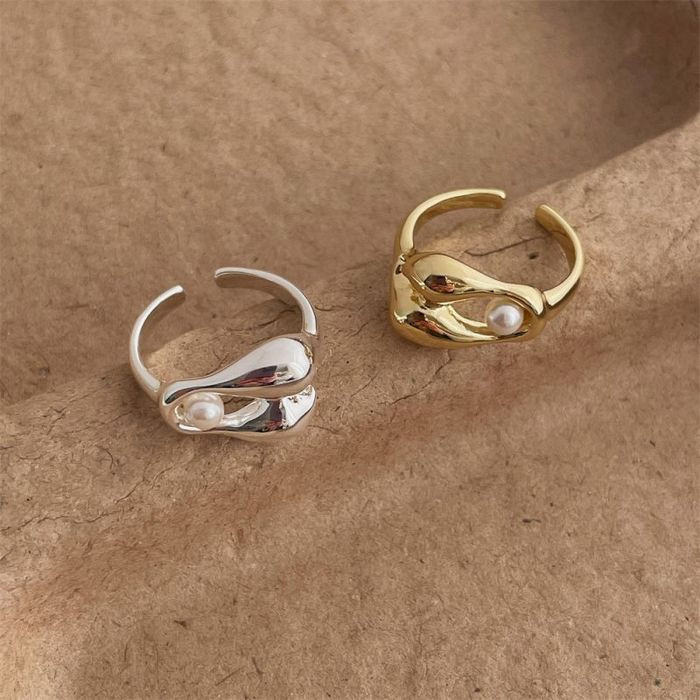 Разомкнутое кольцо в форме извивающейся капли CJL14742