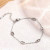 Браслет-нить с овальными элементами серебристый CJH37291