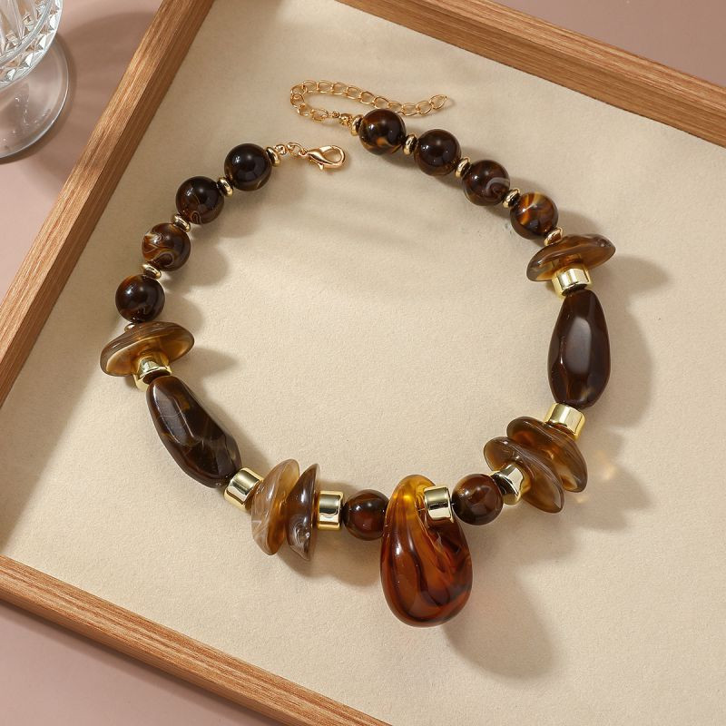 Бусы из коричневого камня с крупными металлическими шарами CJR56912 Бусы из коричневого камня с крупными металлическими шарами CJR56912