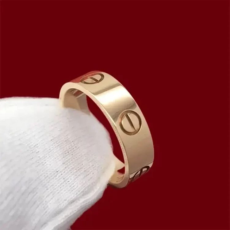 Золотистое стальное кольцо с декором винты J10194CJJ