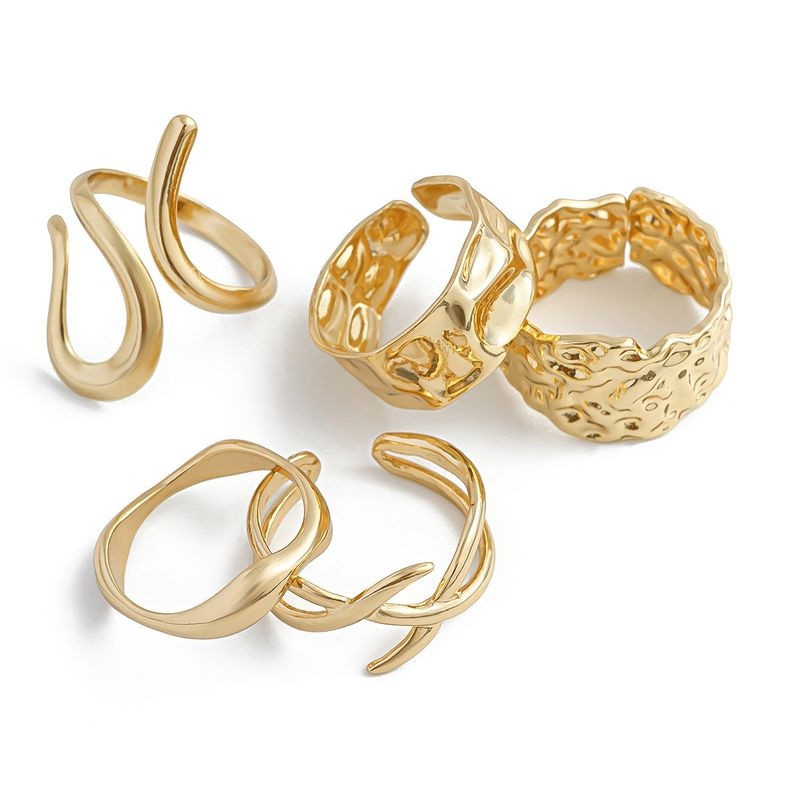 Набор золотистых колец с плетением и фактурными линиями 1J11859CJJ