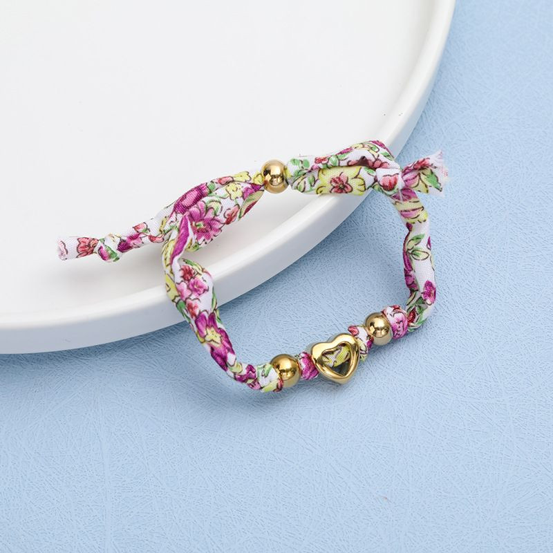 Браслет текстильный плетеный с цветочным принтом CJP37799 Браслет текстильный плетеный с цветочным принтом CJP37799