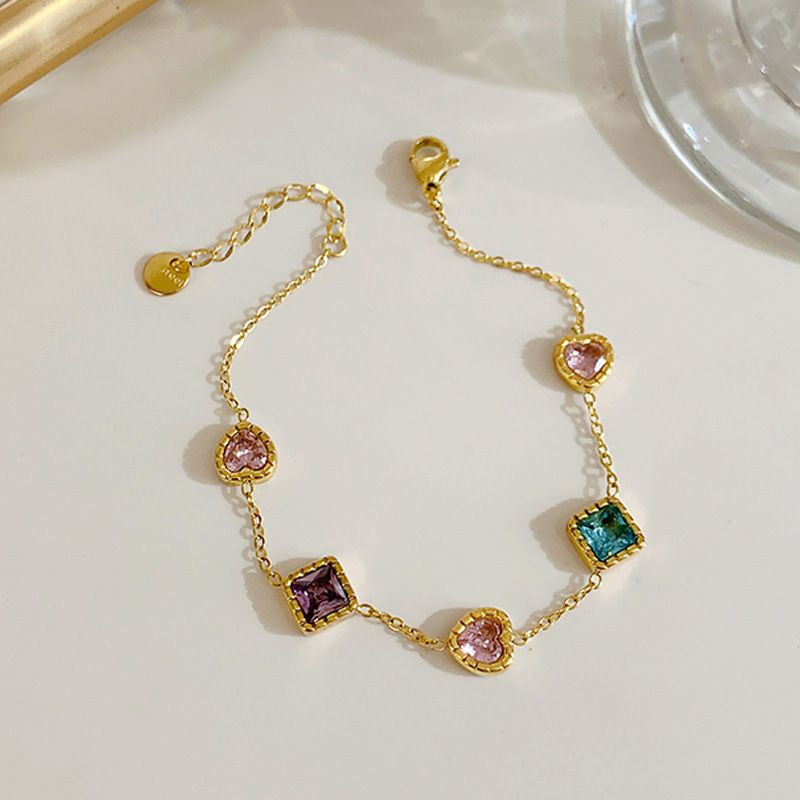 Браслет-цепочка с разноцветными четырехлистниками CJP53985