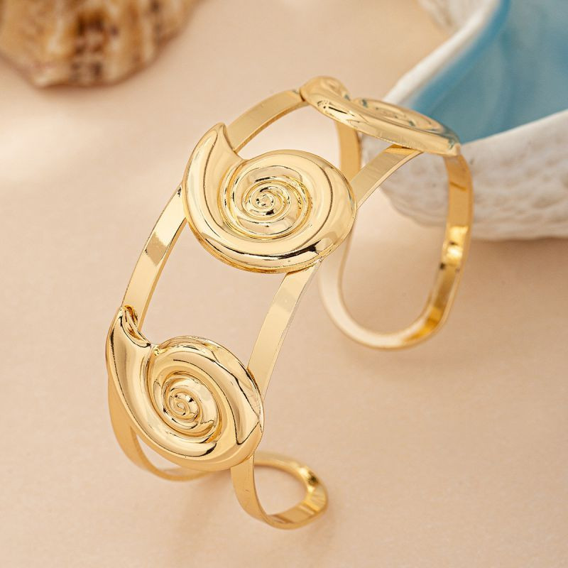 Браслет жесткий разомкнутый с круглыми медальонами CJM14405