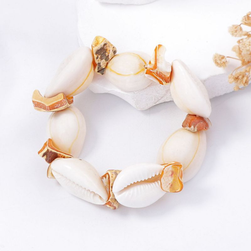 Браслет из крупных ракушек каури CJM01667 Браслет из крупных ракушек каури CJM01667