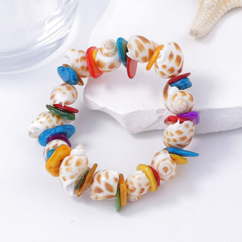 Браслет из крупных ракушек каури CJM01667 Браслет из крупных ракушек каури CJM01667