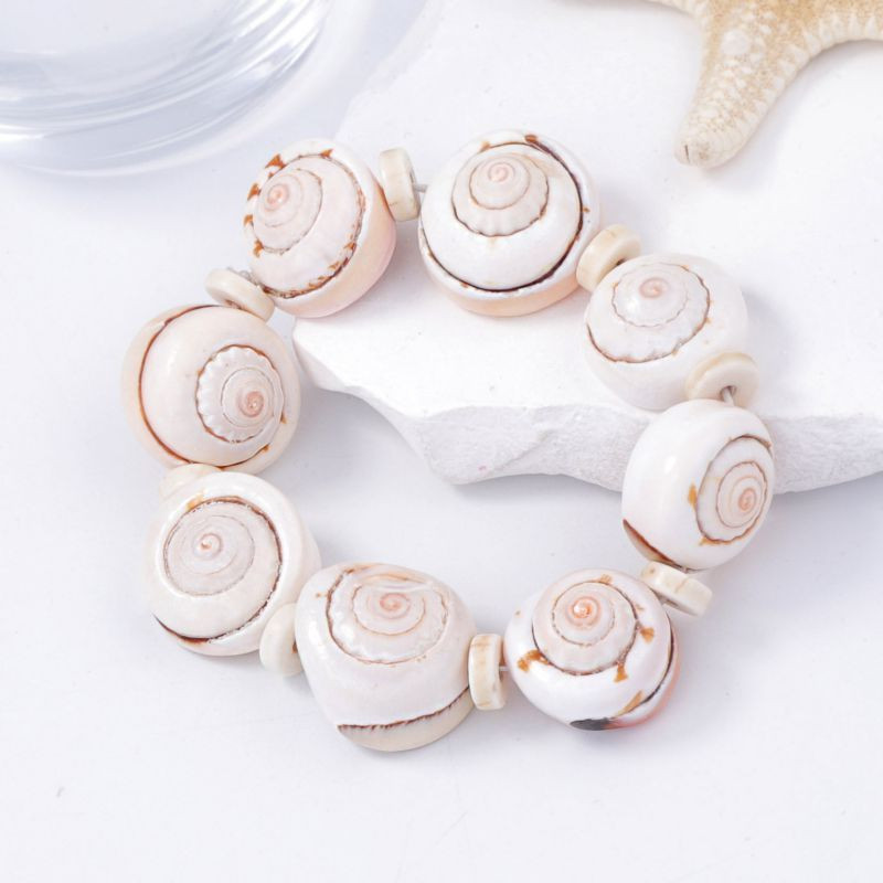 Браслет из крупных ракушек каури CJM01667 Браслет из крупных ракушек каури CJM01667