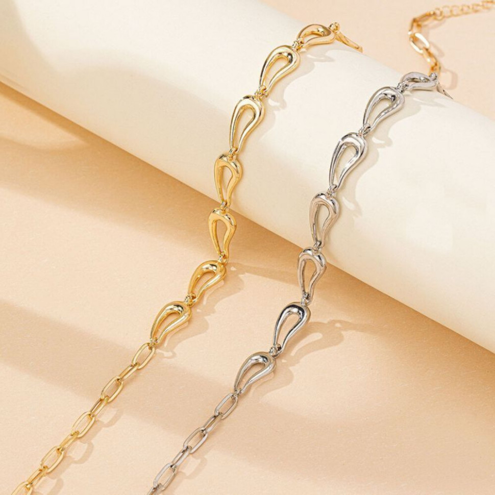 Цепочка из крупных золотистых звеньев необычной формы CJH67223