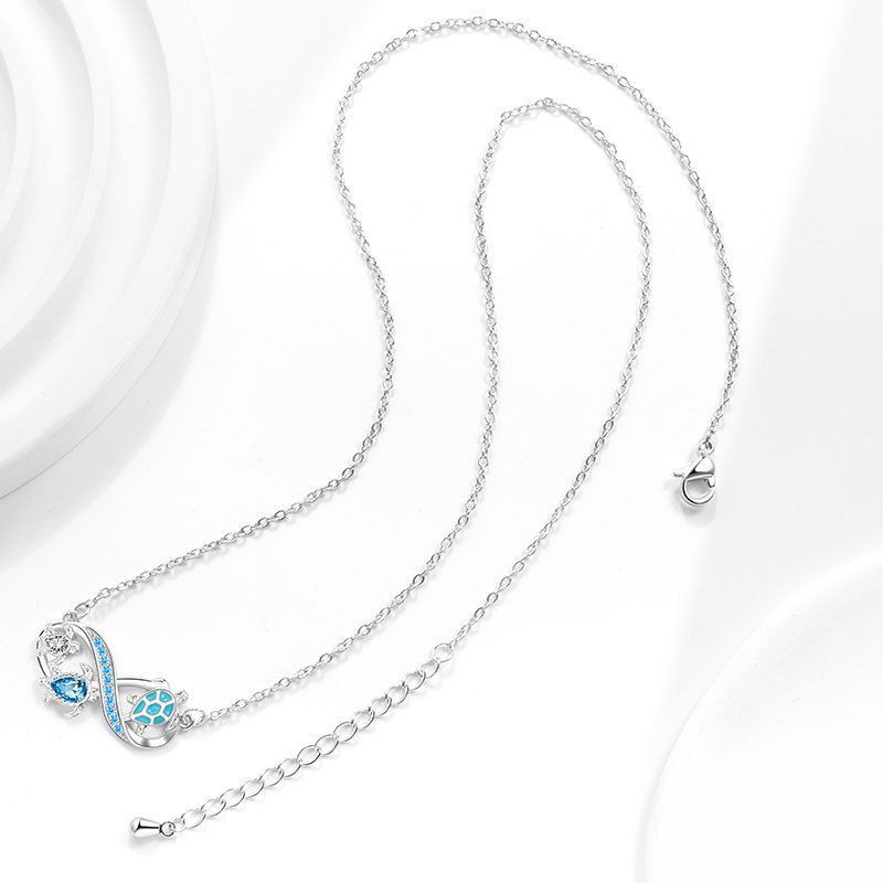 Серебристое колье с черепахой и бесконечностью из циркона CJX78863