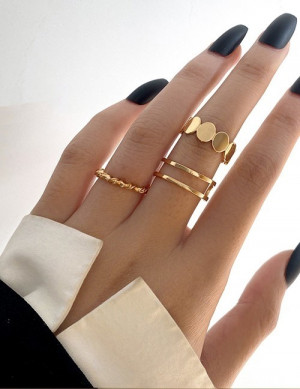 Набор золотистых колец с геометрическими мотивами G00663