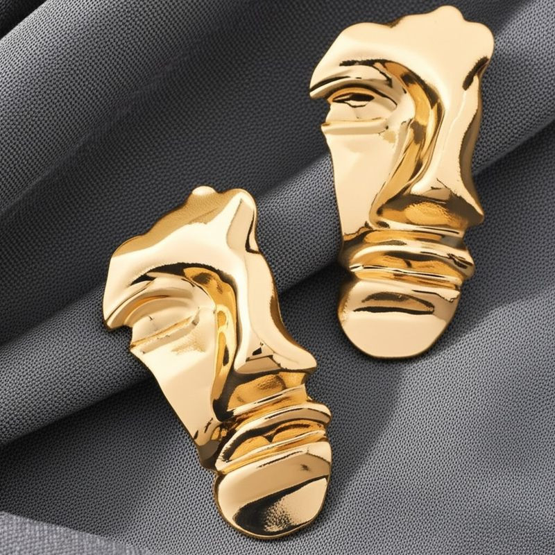 Длинные золотистые серьги из ювелирного сплава в форме абстрактных лиц 1DNS11100CJJ