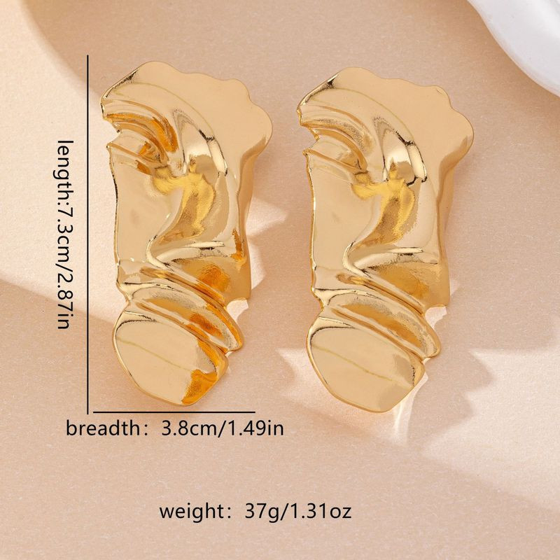 Длинные золотистые серьги из ювелирного сплава в форме абстрактных лиц 1DNS11100CJJ