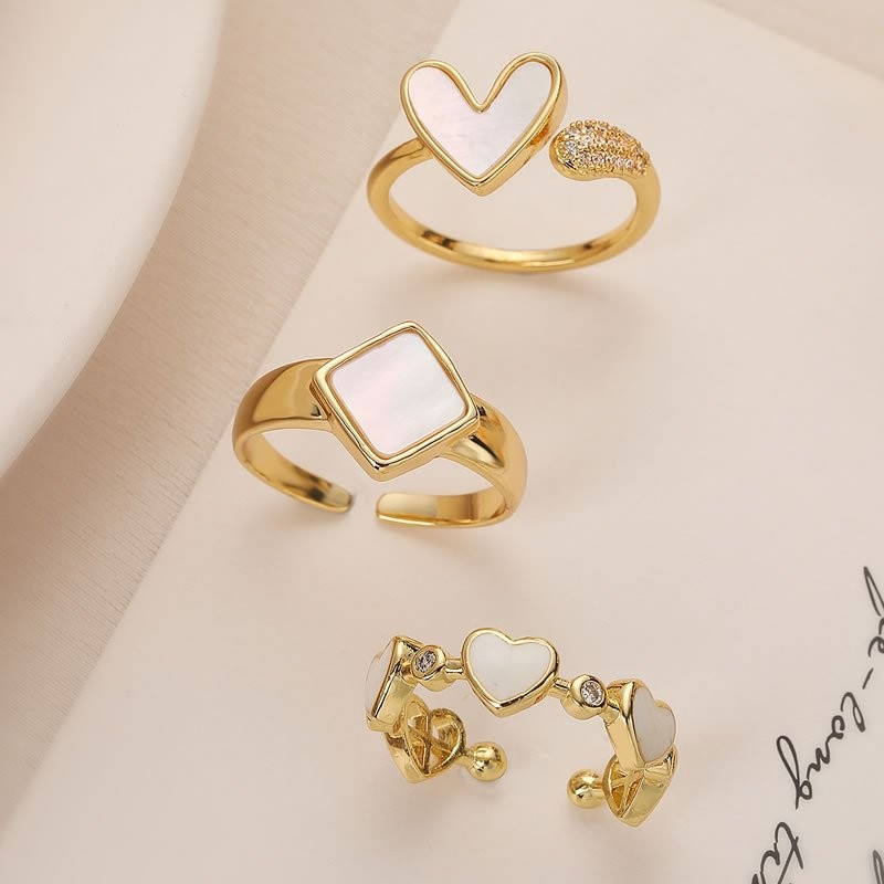 Кольцо с дорожкой из трех сердец и перламутром N78329 Кольцо с дорожкой из трех сердец и перламутром N78329