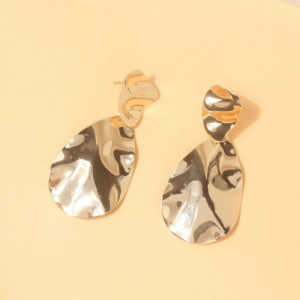 Серьги-подвески из «мятого» металла абстрактной формы N00508 Серьги-подвески из «мятого» металла абстрактной формы N00508