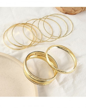 Набор жестких браслетов разной ширины с фактурной насечкой G51893