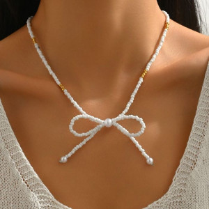 Тонкое колье в форме объемного светлого банта CJM69615 Тонкое колье в форме объемного светлого банта CJM69615