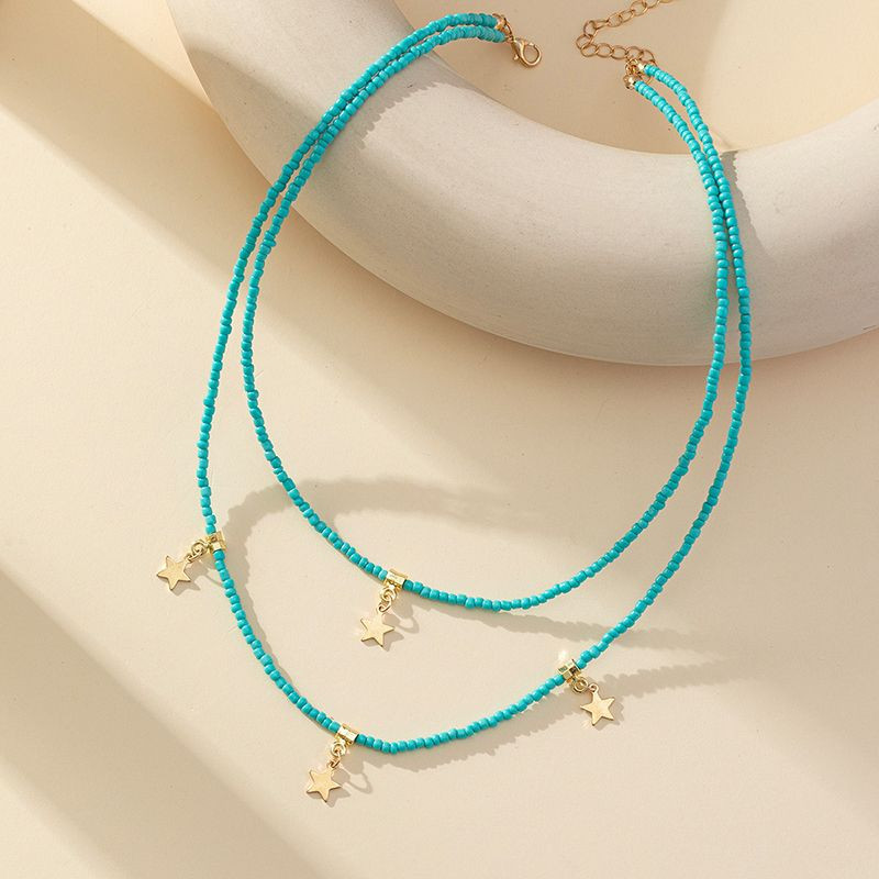 Тройная цепочка из цветного бисера со звездными подвесками CJT27566