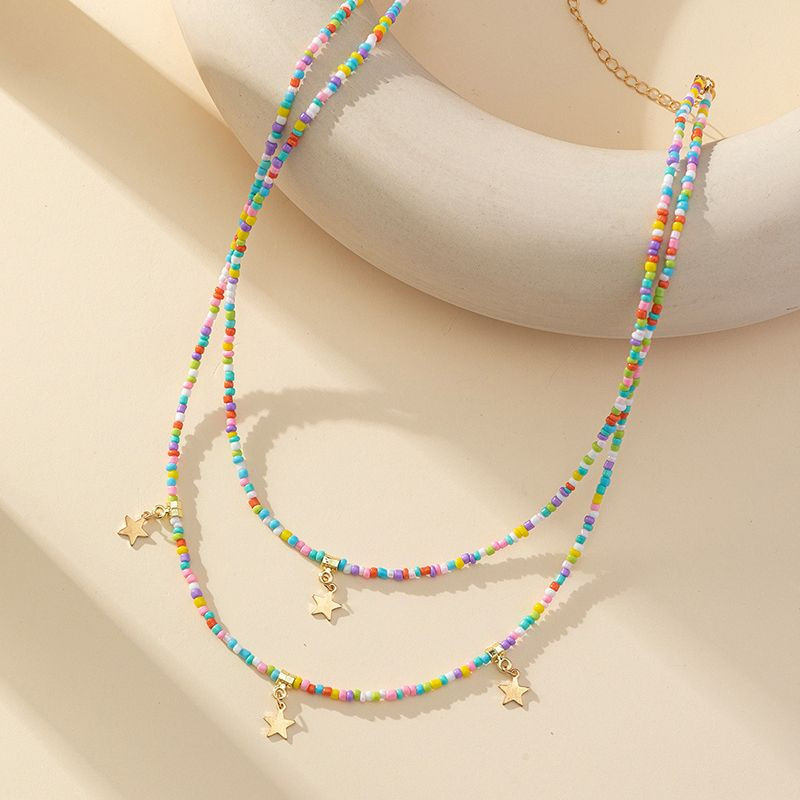 Тройная цепочка из цветного бисера со звездными подвесками CJT27566