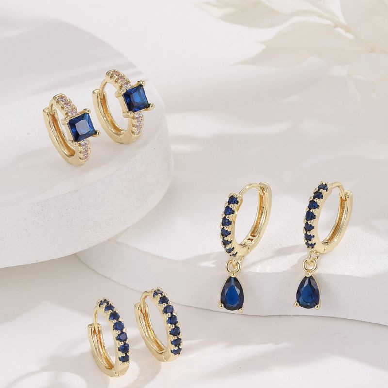 Золотистые серьги-конго с синими каплями CJR59487 Золотистые серьги-конго с синими каплями CJR59487