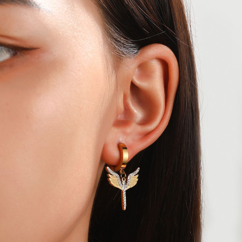 Серьги стальные с напылением золотом скипетр J10203CJJ