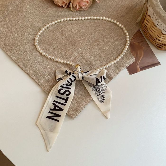 Многослойное колье из жемчуга и текстильной ленты CJM37697 Многослойное колье из жемчуга и текстильной ленты CJM37697