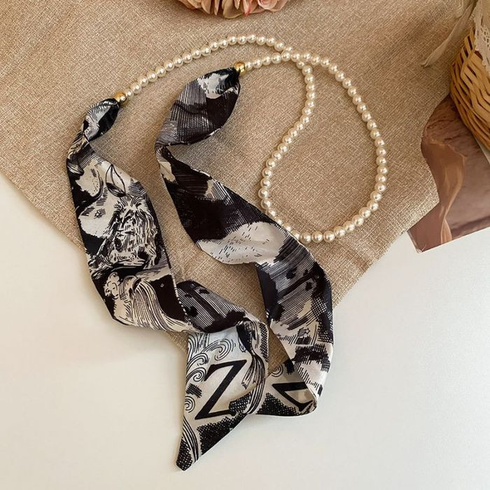 Многослойное колье из жемчуга и текстильной ленты CJM37697 Многослойное колье из жемчуга и текстильной ленты CJM37697