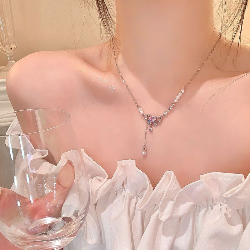 Серебристое колье с бантом из титановой стали CJX86996