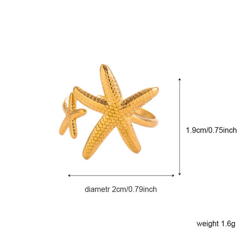 Кольцо медицинская сталь с напылением золотом морская звезда 1J12032CJJ Кольцо медицинская сталь с напылением золотом морская звезда 1J12032CJJ