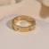 Кольцо стальное с напылением золотом и фианитами J10201(CJJ)